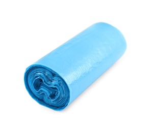 Photo of Roll of light blue garbage bags isolated on white