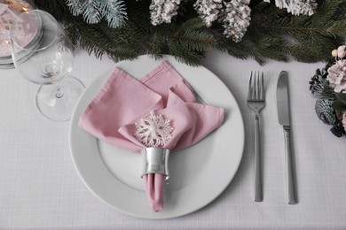 Beautiful festive table setting with Christmas decor, above view