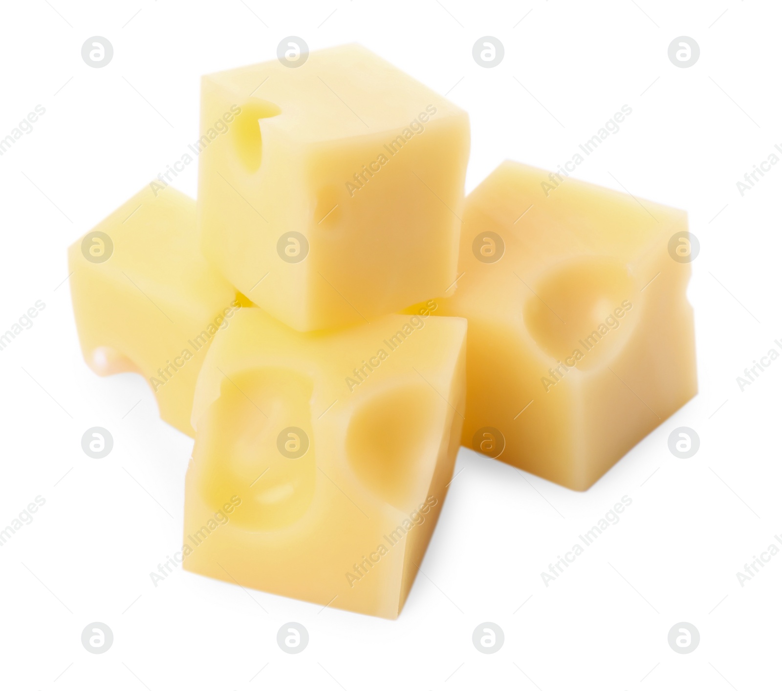 Photo of Cubes of delicious cheese isolated on white