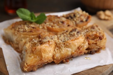 Eastern sweets. Pieces of tasty baklava on table, closeup