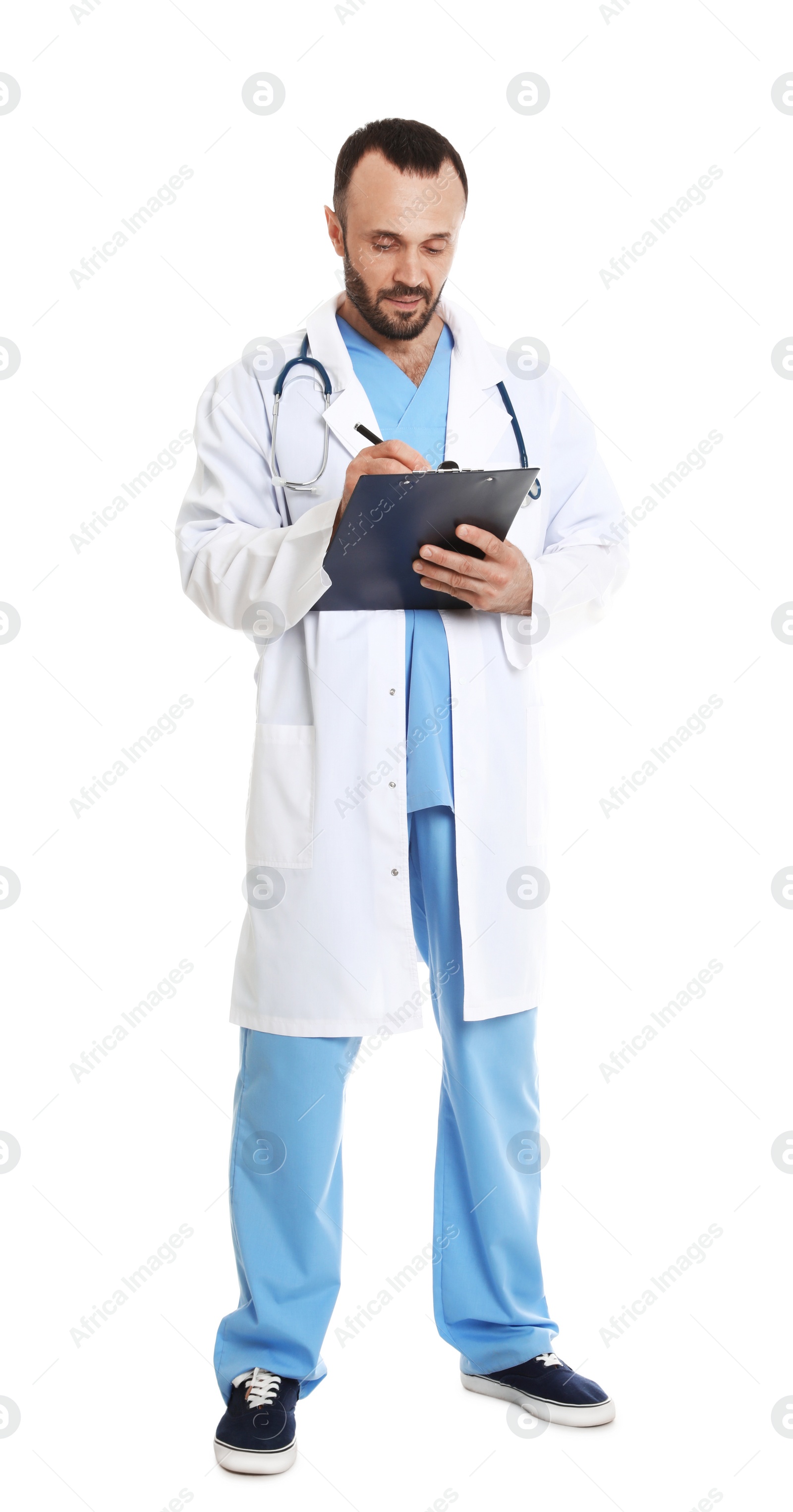 Photo of Full length portrait of male doctor with clipboard isolated on white. Medical staff