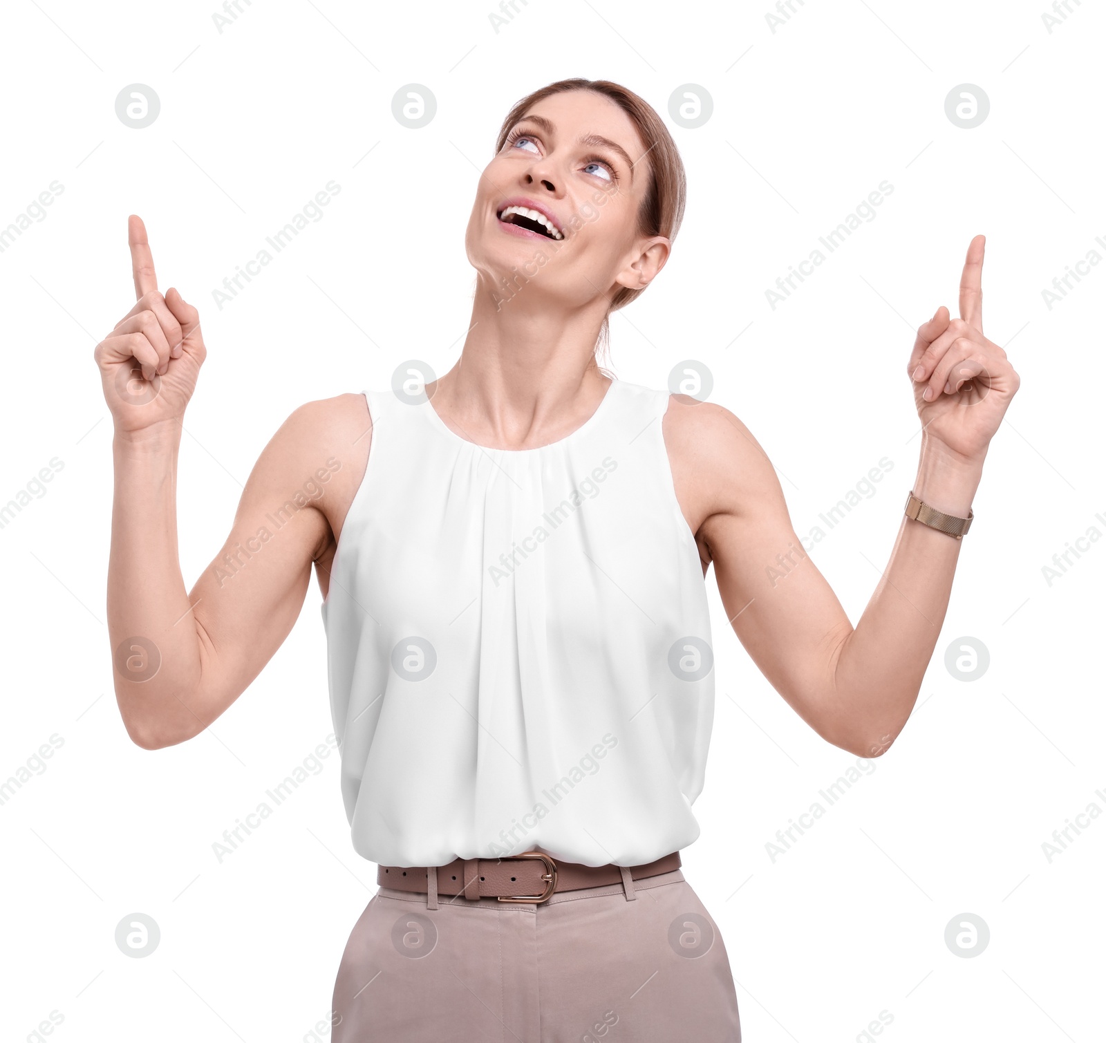 Photo of Beautiful happy businesswoman pointing at something on white background