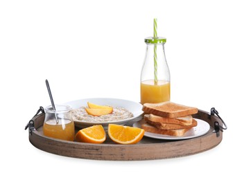 Wooden tray with delicious breakfast on white background