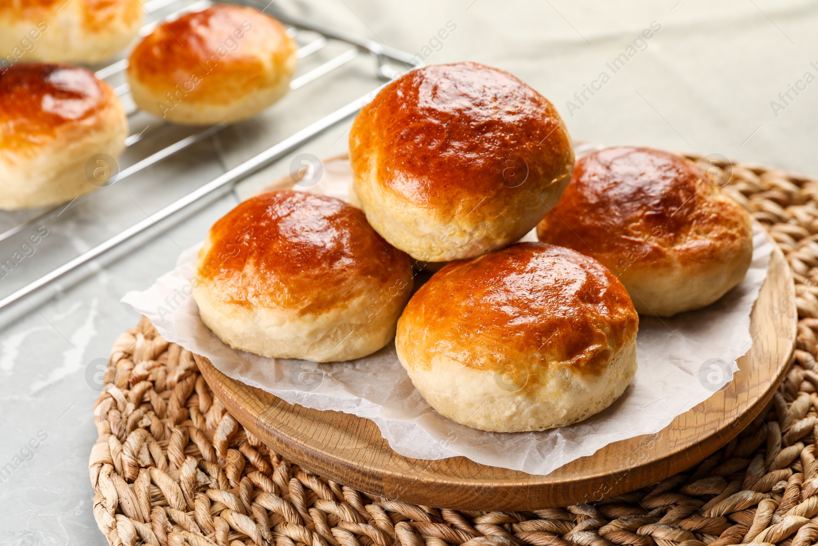 Photo of Tasty scones prepared on soda water on grey marble table