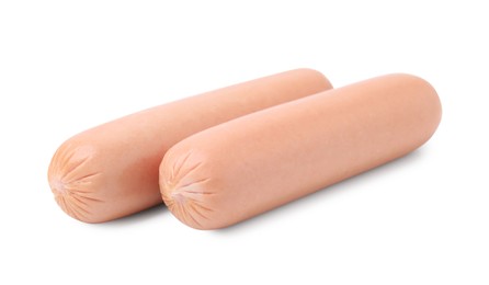 Photo of Two delicious boiled sausages on white background