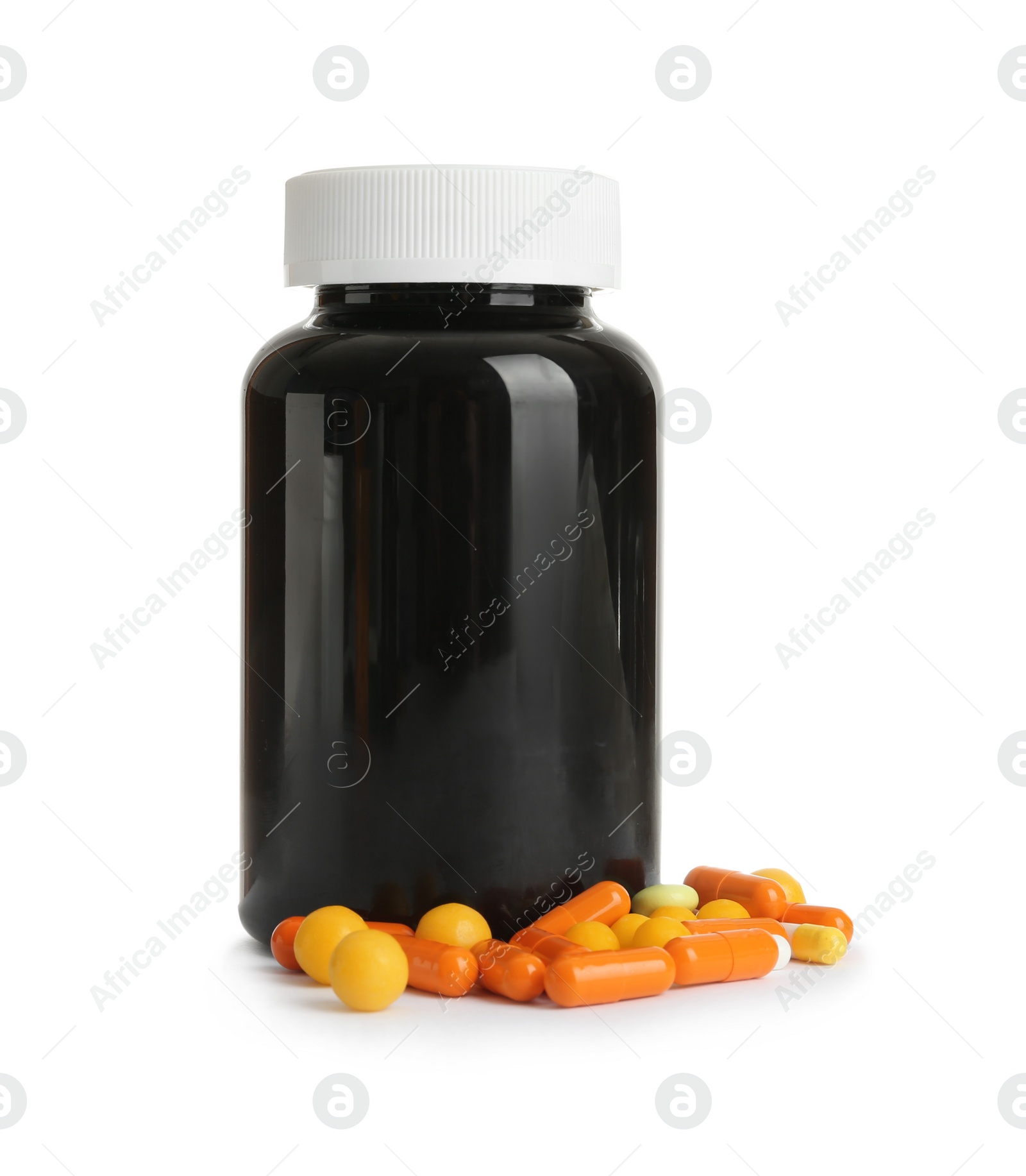 Photo of Bottle with vitamin pills and capsules on white background