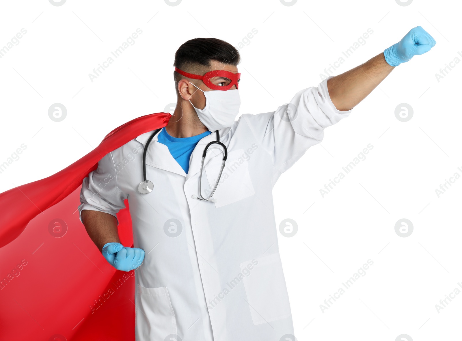 Photo of Doctor wearing face mask and cape on white background. Super hero power for medicine