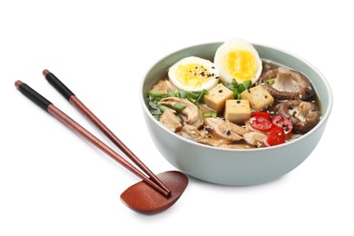 Photo of Bowl of delicious ramen and chopsticks isolated on white. Noodle soup