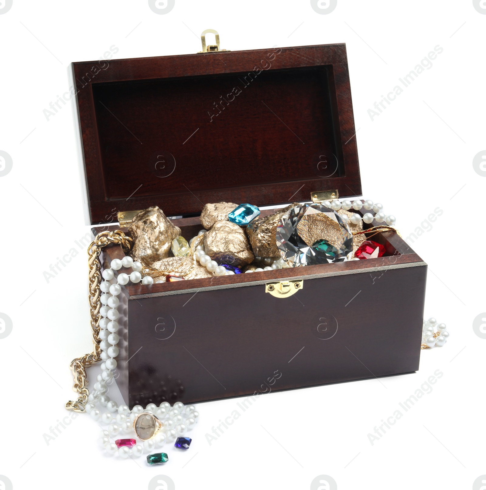 Photo of Wooden chest with treasures isolated on white