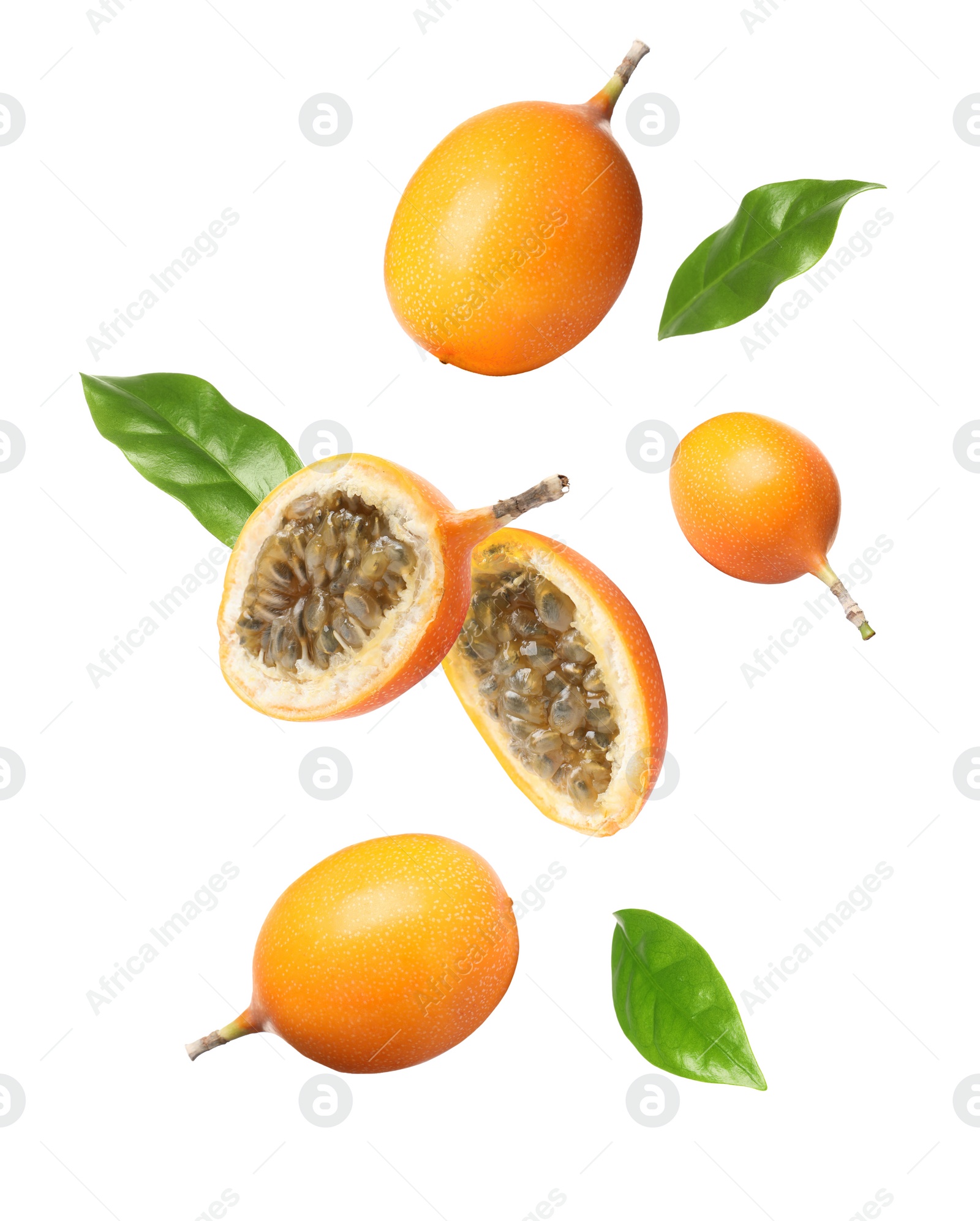 Image of Delicious ripe granadillas falling on white background 