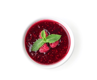 Photo of Bowl with delicious raspberry jam on white background