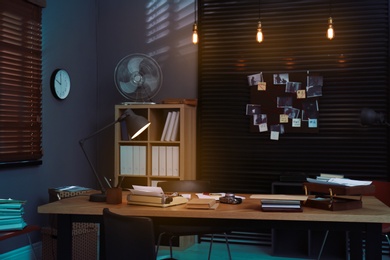 Photo of Detective office interior with evidence board on wall