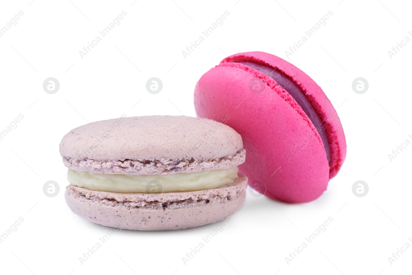 Photo of Different delicious colorful macarons on white background