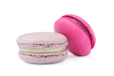 Photo of Different delicious colorful macarons on white background