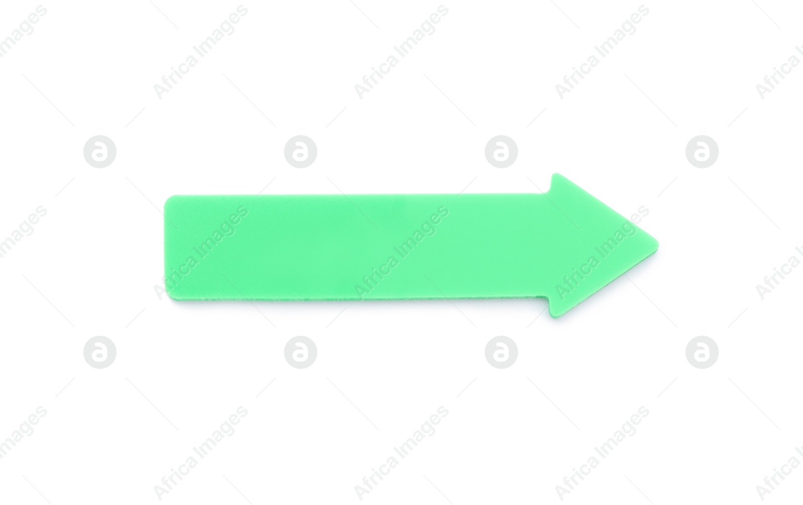 Photo of Colorful arrow shaped sticky note on white background. School stationery