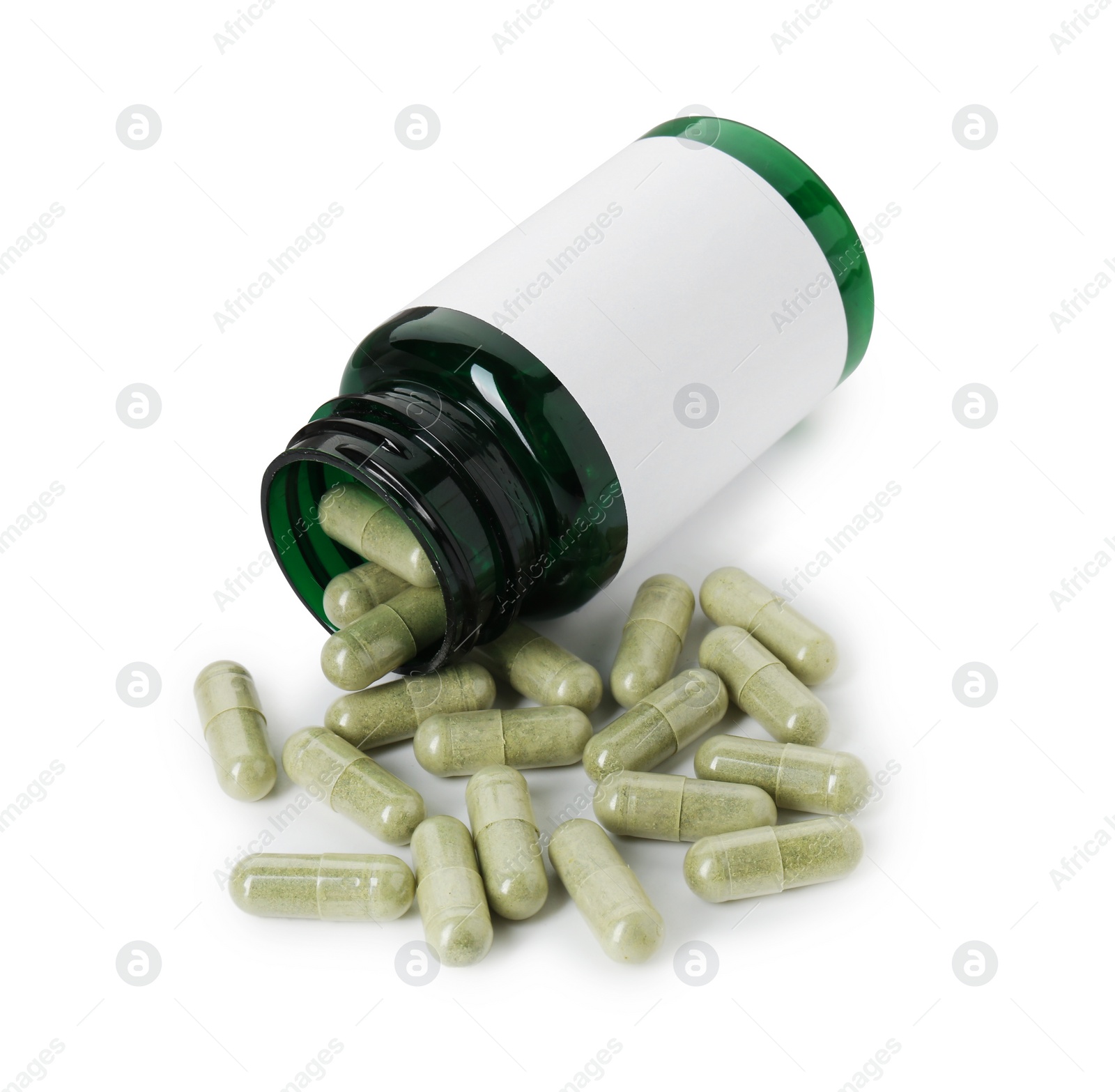 Photo of Scattered vitamin capsules and bottle isolated on white