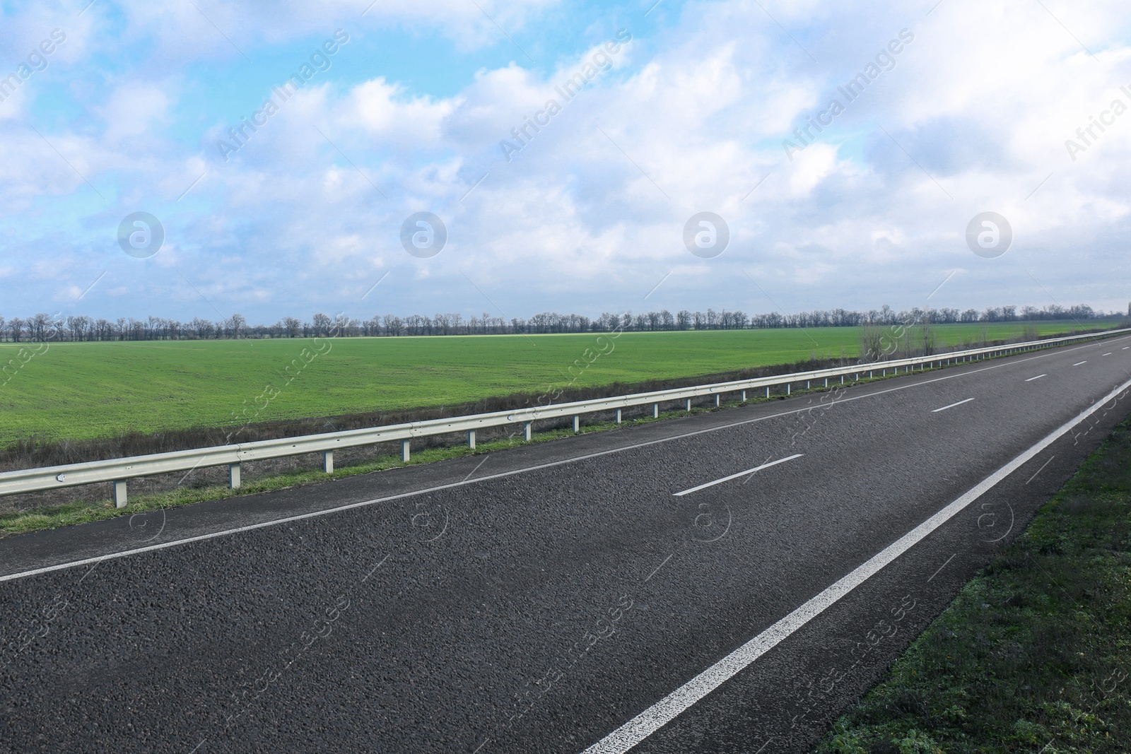 Photo of Beautiful view of asphalt highway without transport