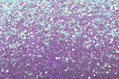 Beautiful shiny lilac glitter as background, closeup