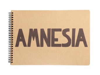 Photo of Notebook with word Amnesia on white background, top view