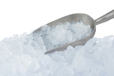 Photo of Heap of crushed ice and metal scoop on white background