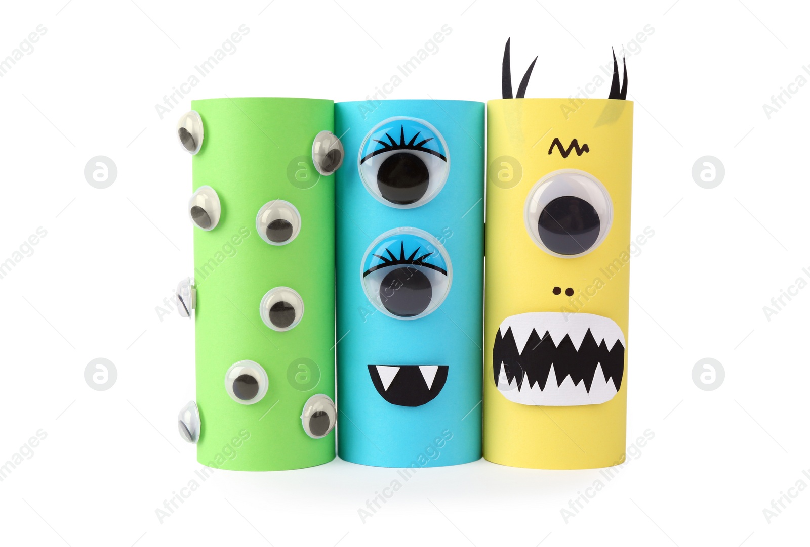 Photo of Monsters made of paper isolated on white. Halloween decoration