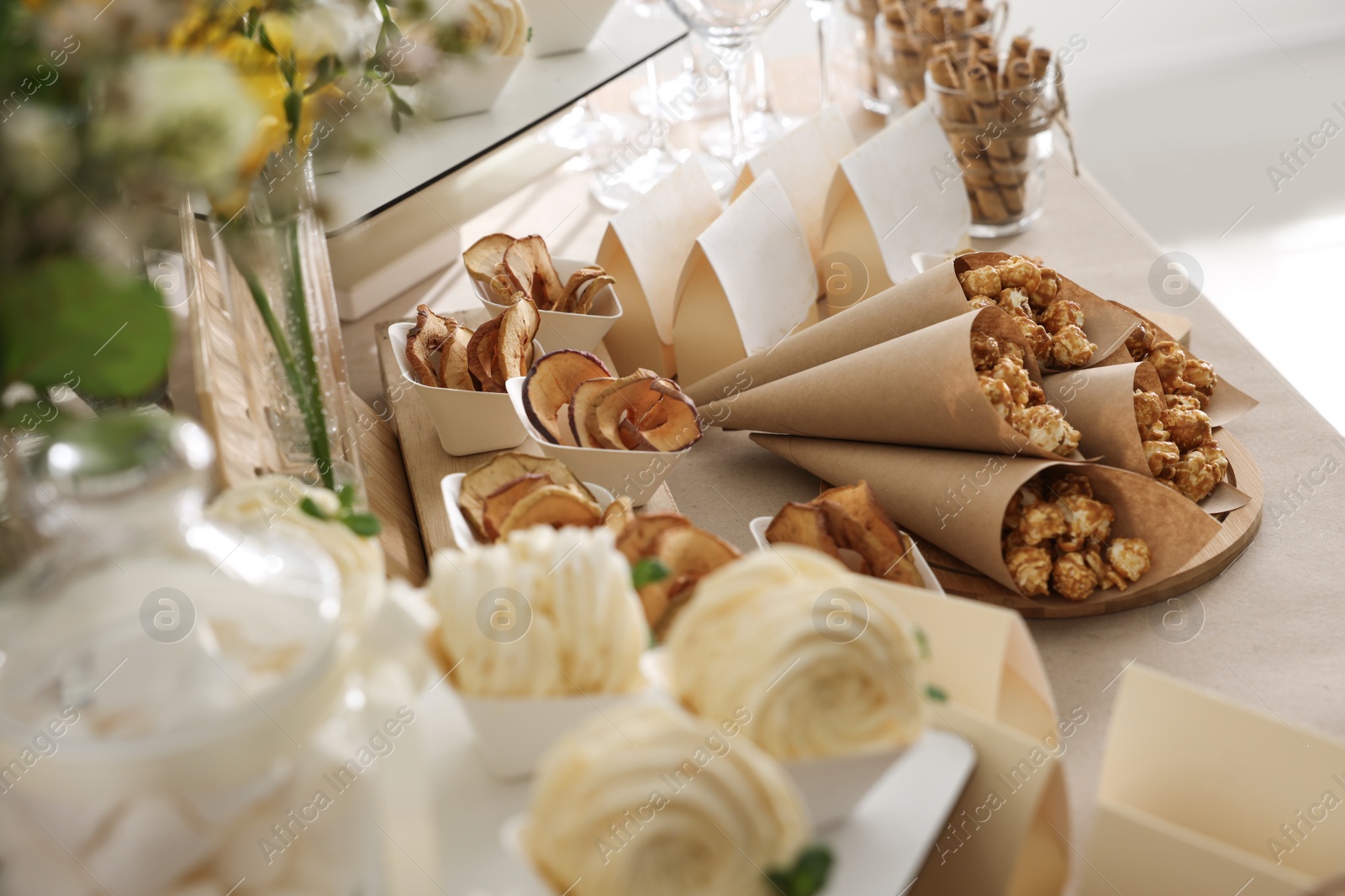 Photo of Tasty treats on table in room. Sweet buffet