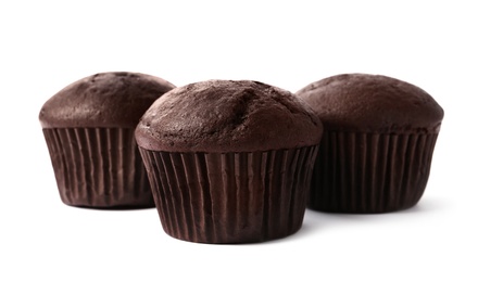Delicious fresh chocolate cupcakes isolated on white