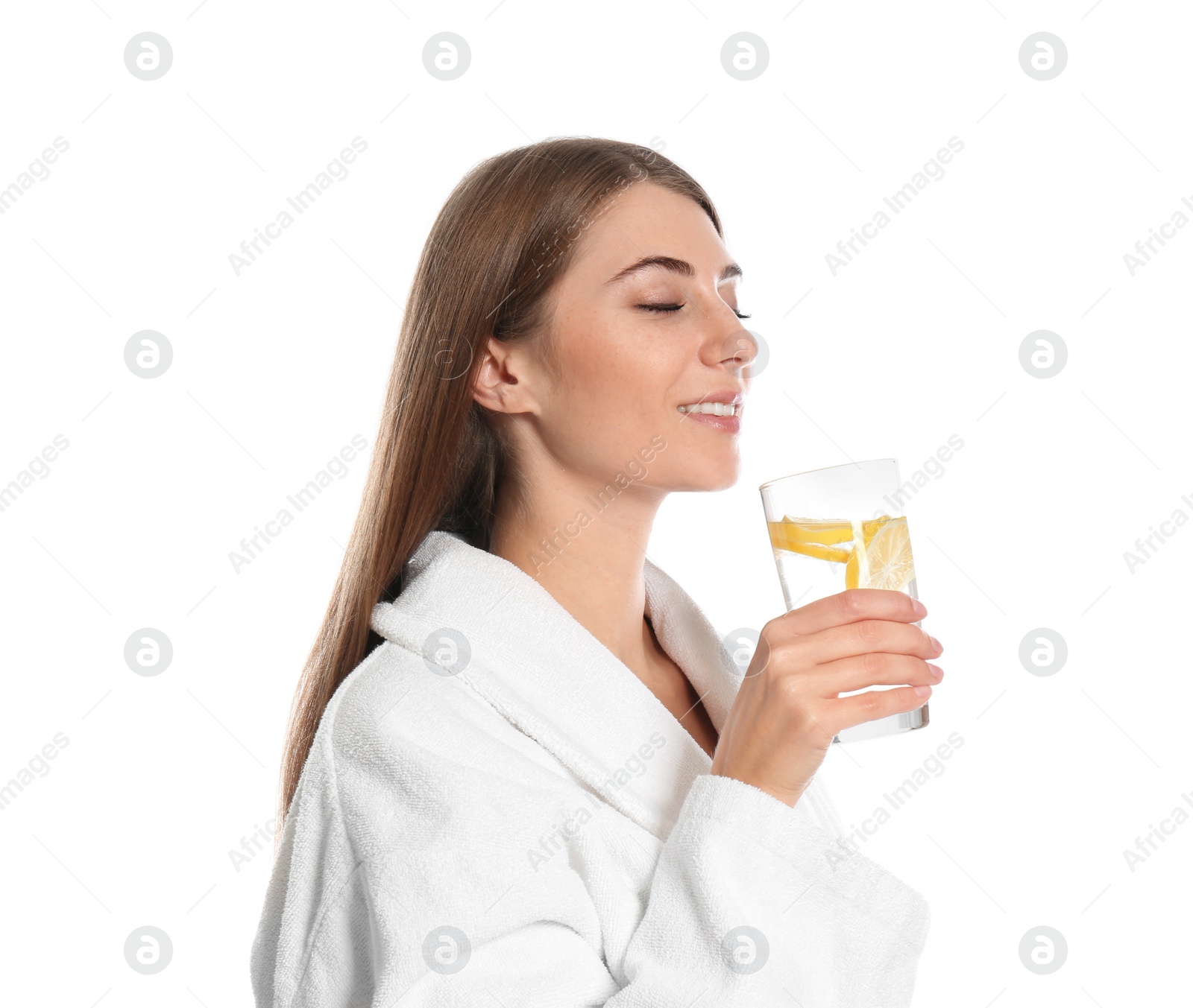 Photo of Young woman drinking lemon water on white background