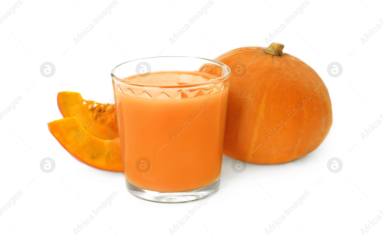 Photo of Glass with pumpkin juice and fresh vegetables on white background