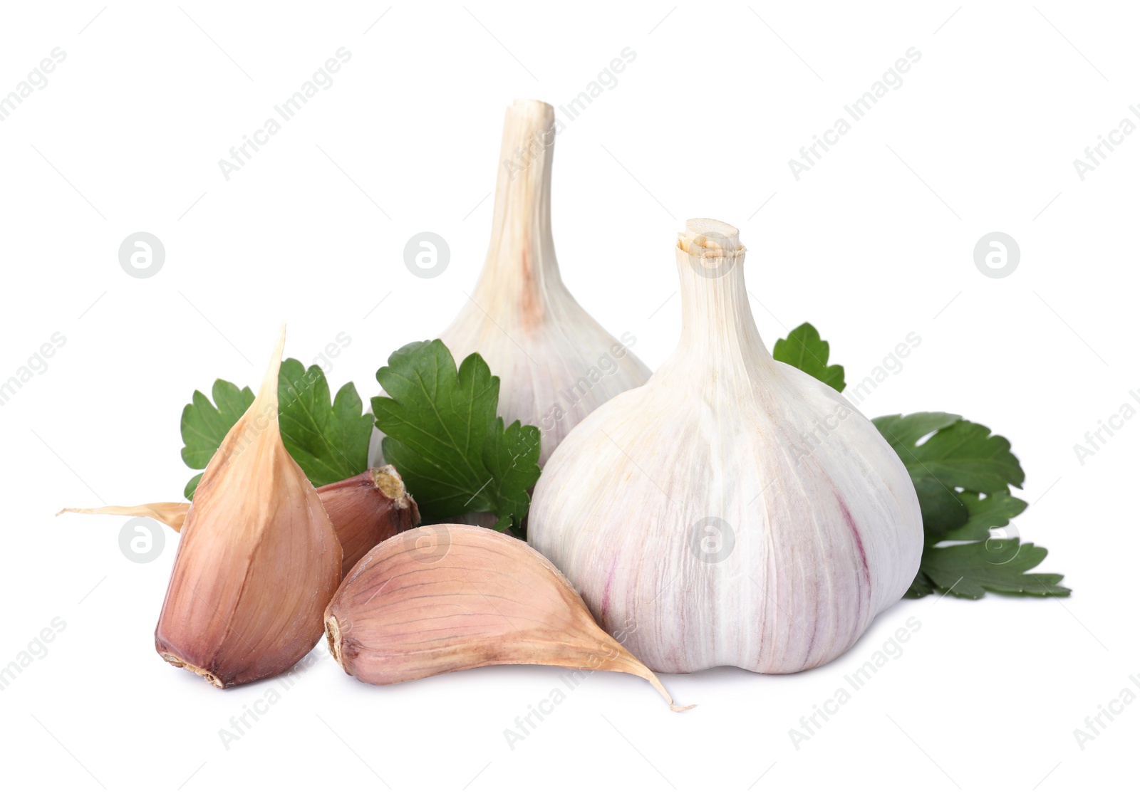 Photo of Fresh garlic bulbs and cloves with parsley on white background. Organic food