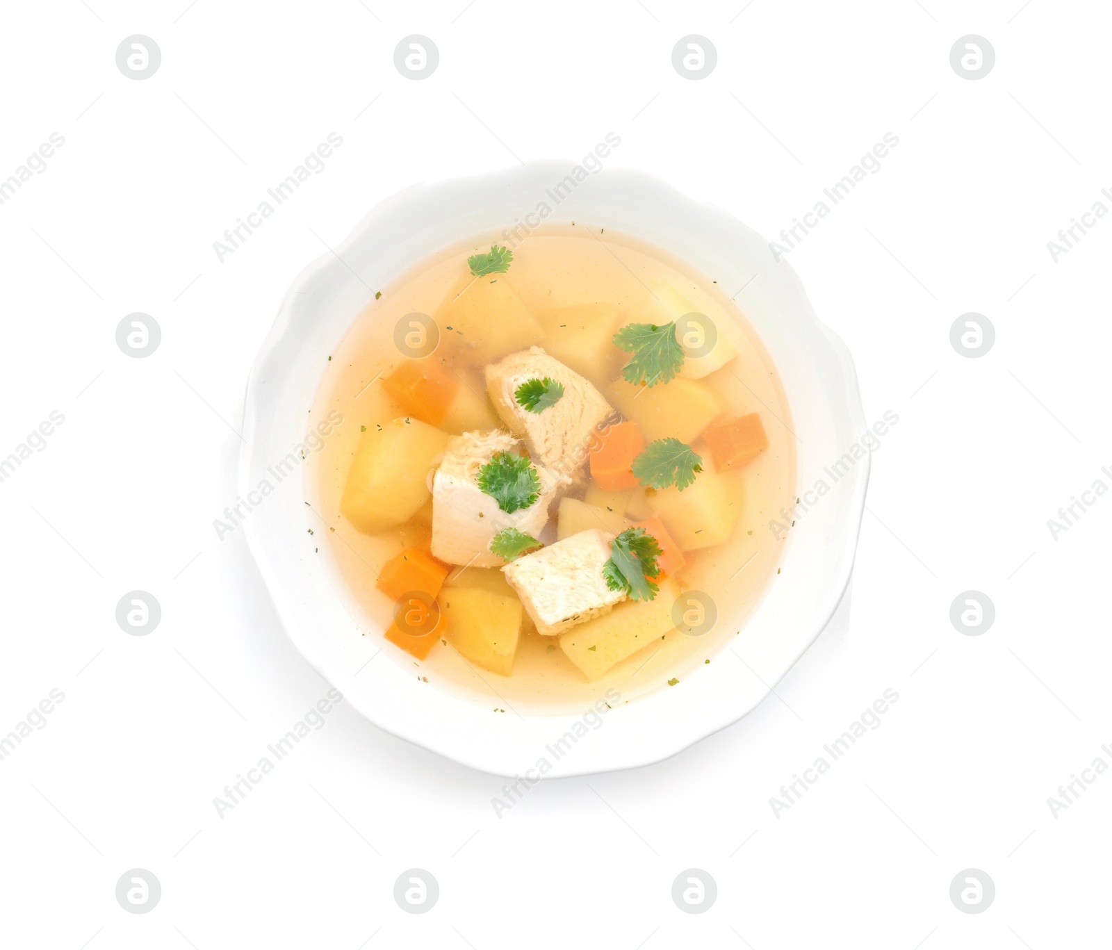 Photo of Dish with fresh homemade chicken soup on white background, top view