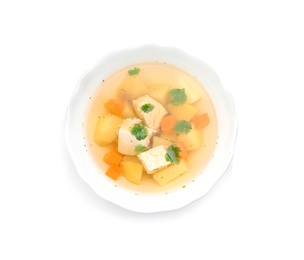 Photo of Dish with fresh homemade chicken soup on white background, top view