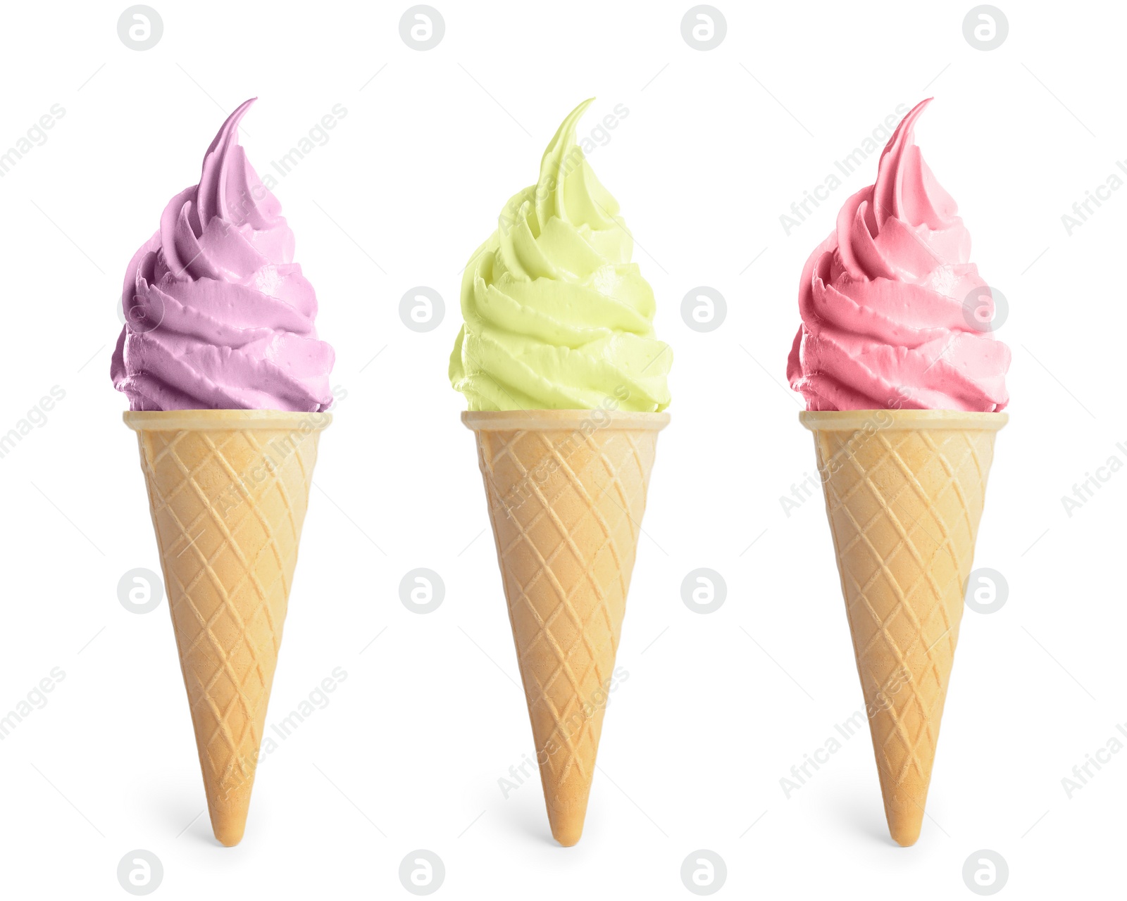 Image of Set of different delicious soft serve ice creams in crispy cones on white background