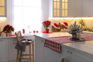 Beautiful kitchen interior with stylish Christmas decor