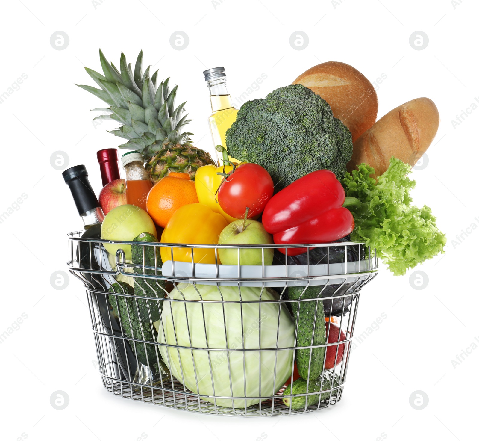 Photo of Shopping basket with grocery products on white background