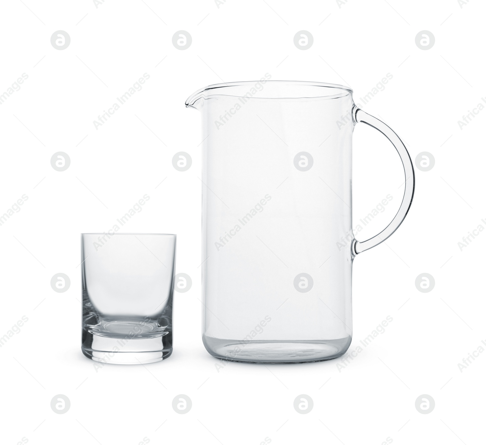 Image of Empty glass and jug isolated on white