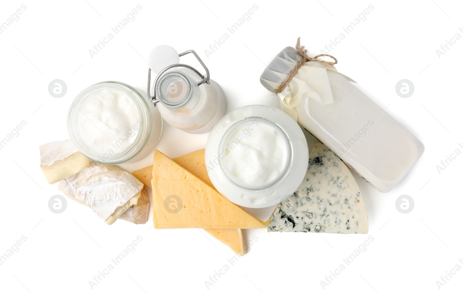 Photo of Different fresh dairy products isolated on white, top view