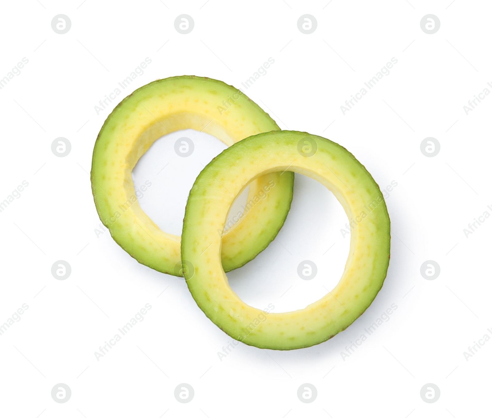 Photo of Slices of ripe avocado on white background