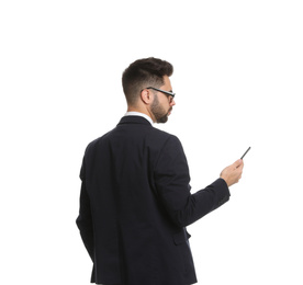 Young businessman with smartphone on white background