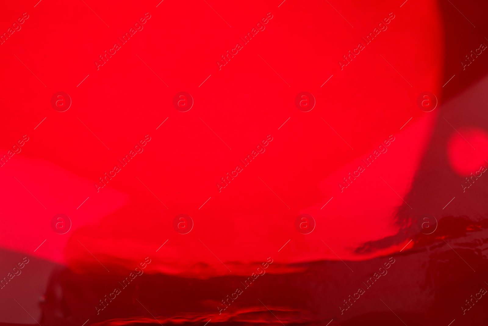 Photo of Delicious red jelly as background, closeup view