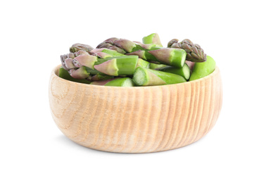 Photo of Raw cut asparagus in wooden bowl isolated on white