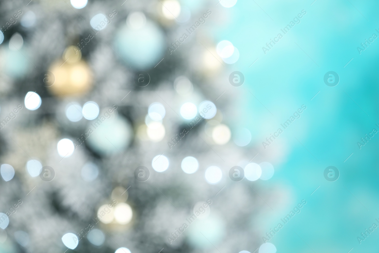 Photo of Beautiful Christmas tree with lights against blue background, blurred view. Space for text