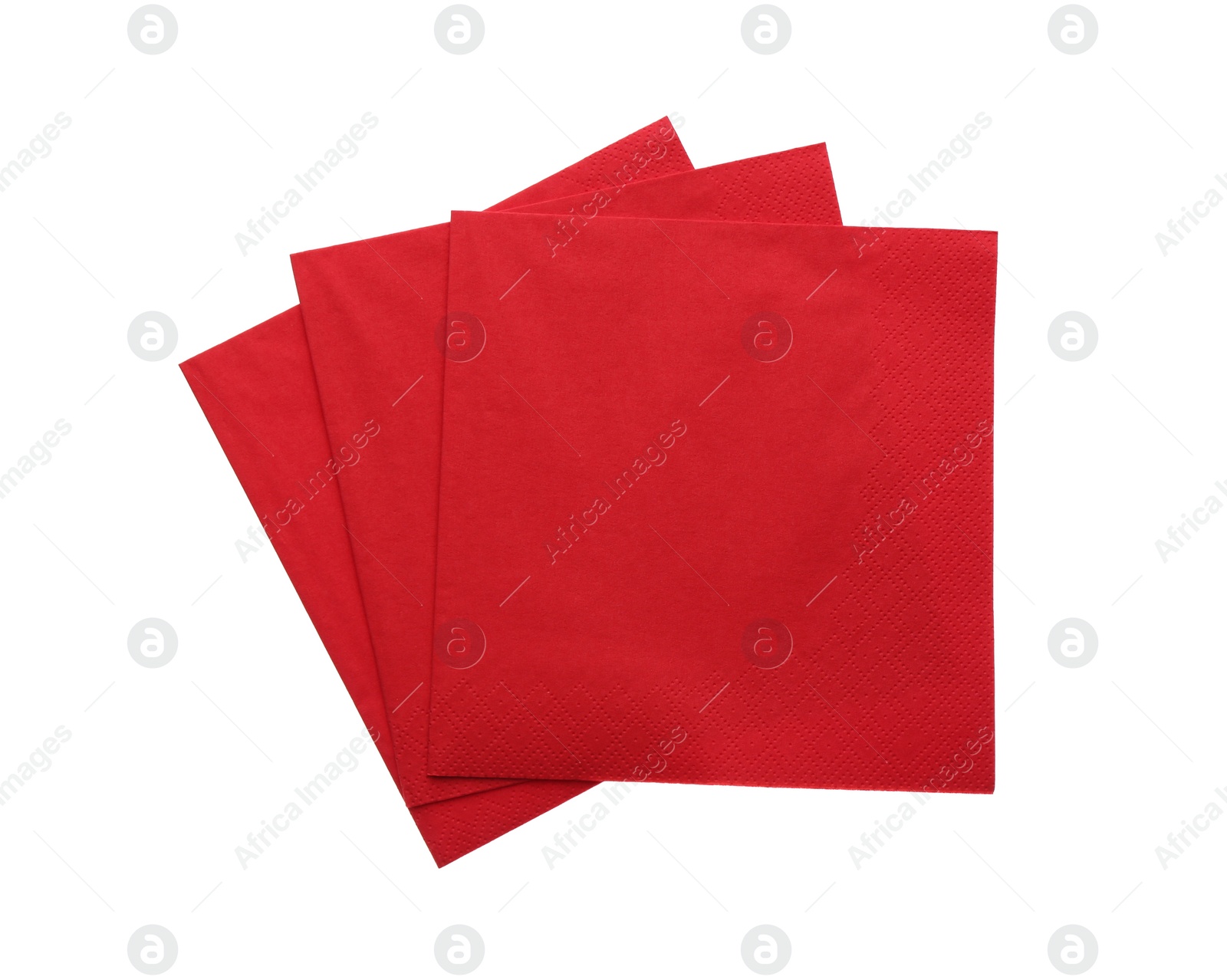 Photo of Red clean paper tissues on white background, top view