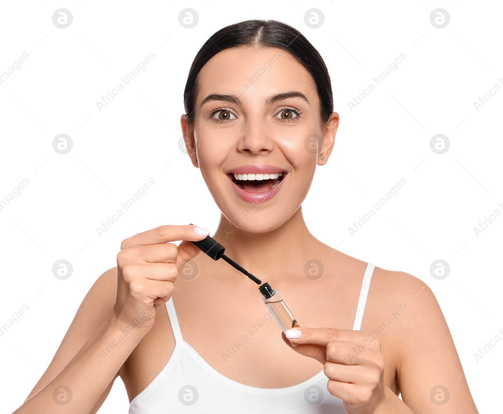 Photo of Excited woman with eyelash oil on white background