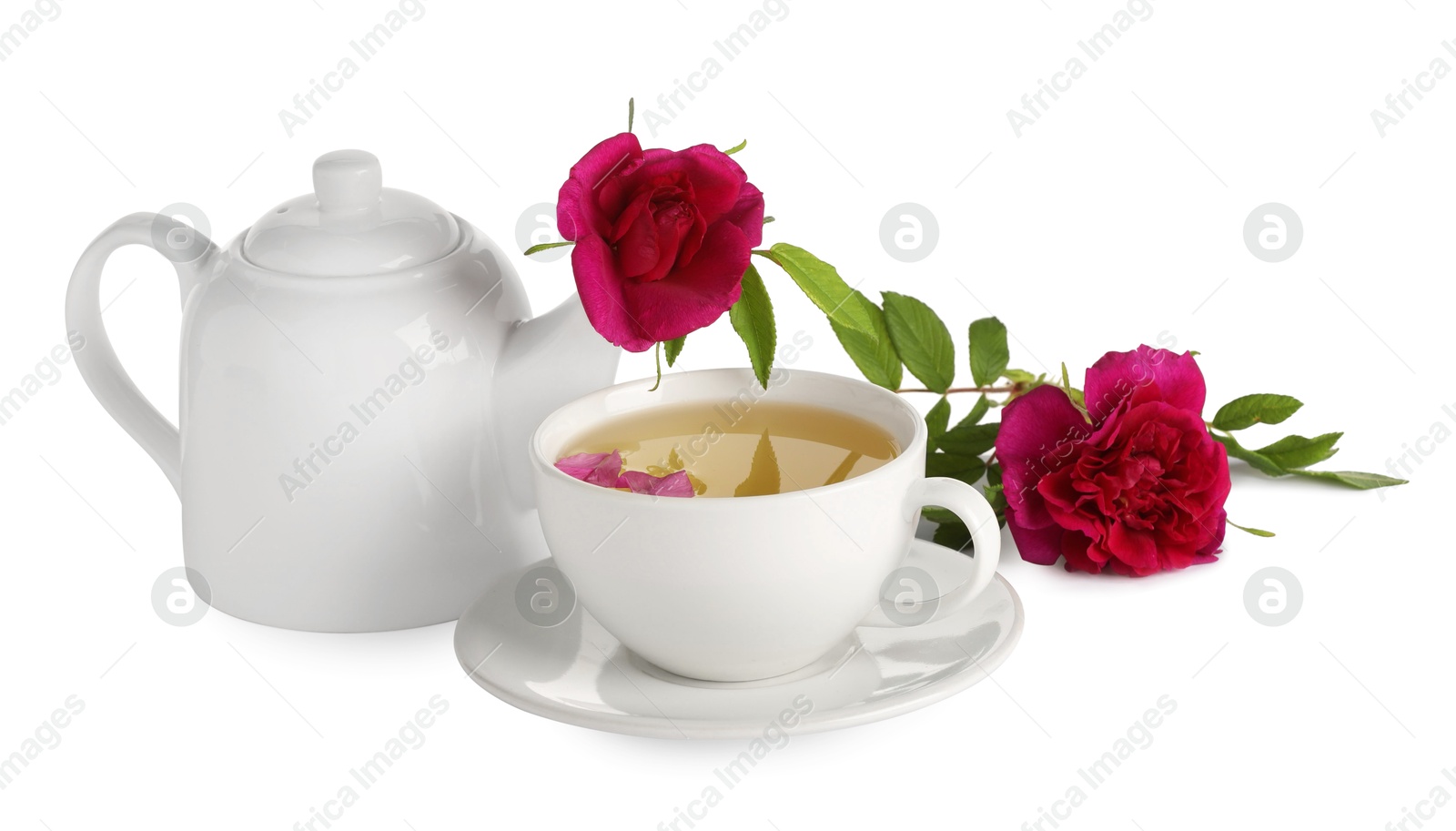 Photo of Aromatic herbal tea with rose flowers isolated on white