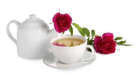 Aromatic herbal tea with rose flowers isolated on white