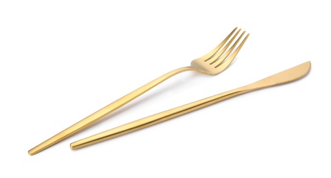 Shiny golden fork and knife isolated on white. Luxury cutlery