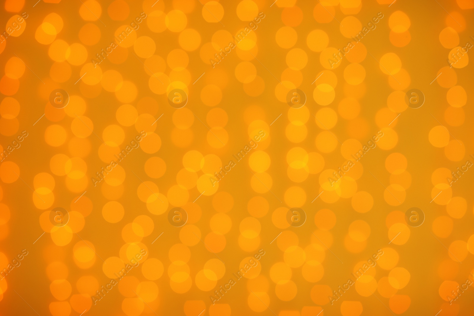 Photo of Beautiful gold lights as background. Bokeh effect