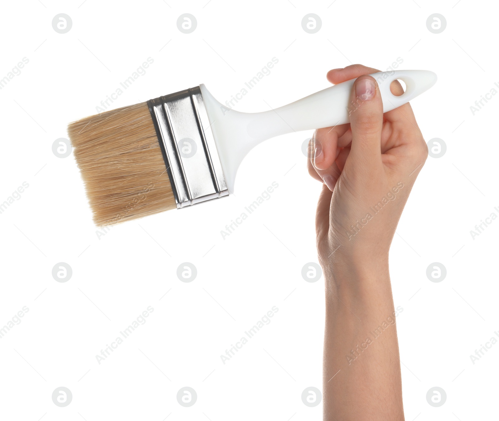 Photo of Woman holding paint brush on white background, closeup