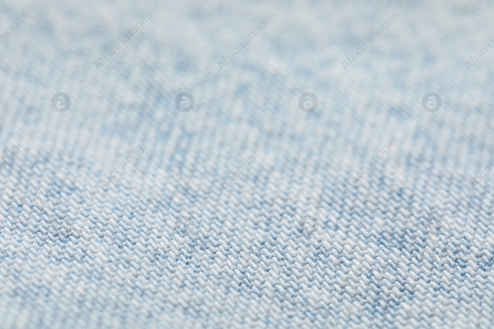 Photo of Texture of soft light blue fabric as background, closeup